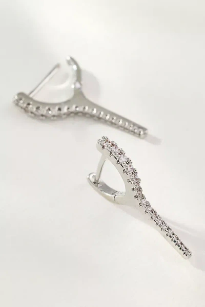 By Anthropologie Elongated Crystal Huggie Earrings In Metallic
