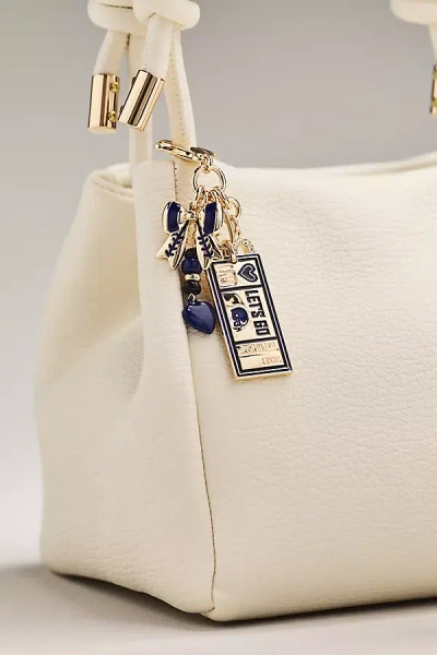 By Anthropologie Football Team Bag Charm In Purple