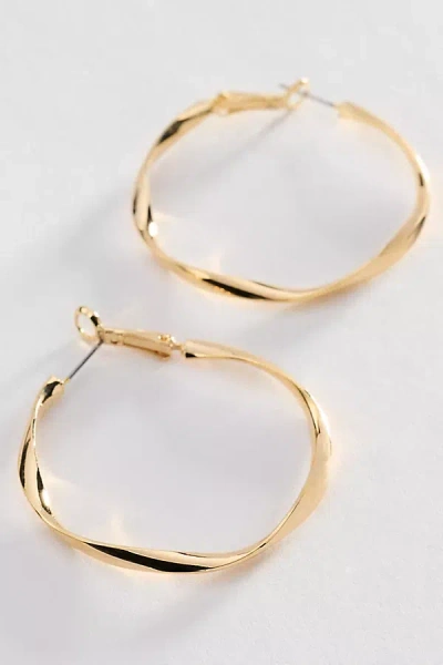 By Anthropologie Hammered Hoop Earrings In Gold