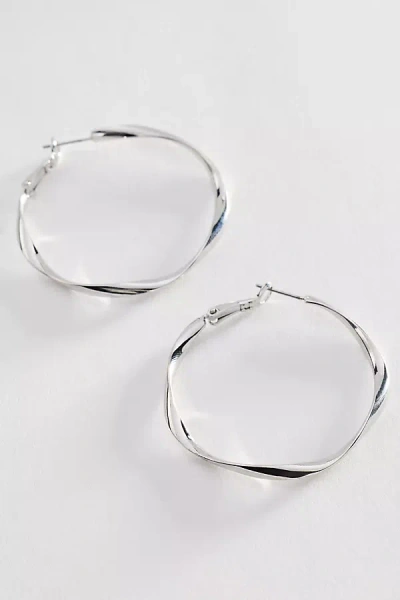 By Anthropologie Hammered Hoop Earrings In Metallic