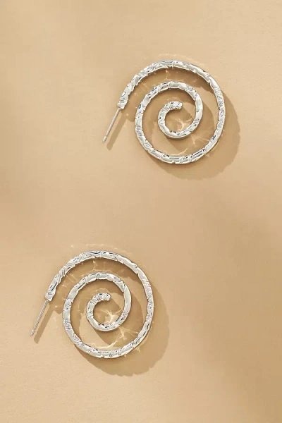 By Anthropologie Hammered Spiral Hoop Earrings In Metallic