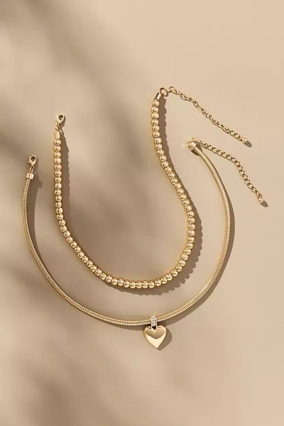By Anthropologie Heart Charm Layered Necklaces, Set Of 2 In Gold