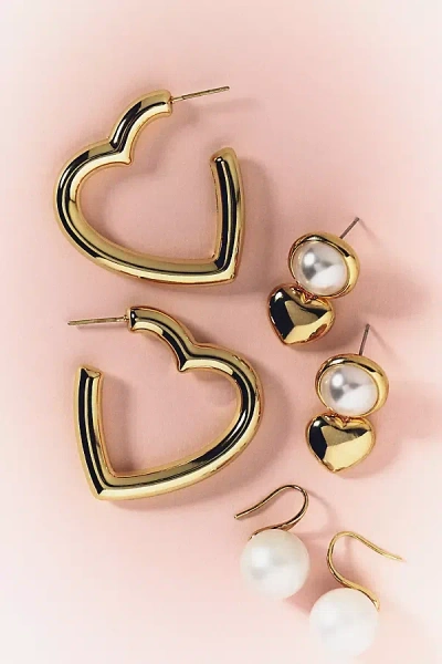 By Anthropologie Heart-shaped Hoop Earrings In Gold