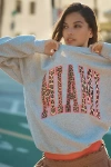 BY ANTHROPOLOGIE LEOPARD CITY SWEATSHIRT