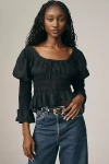 By Anthropologie Long-sleeve Smocked Babydoll Top In Black