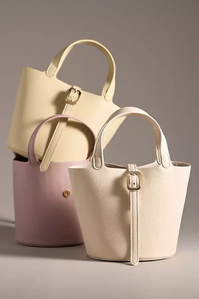 By Anthropologie Mini Pebbled Faux-leather Bucket Bag In Beige