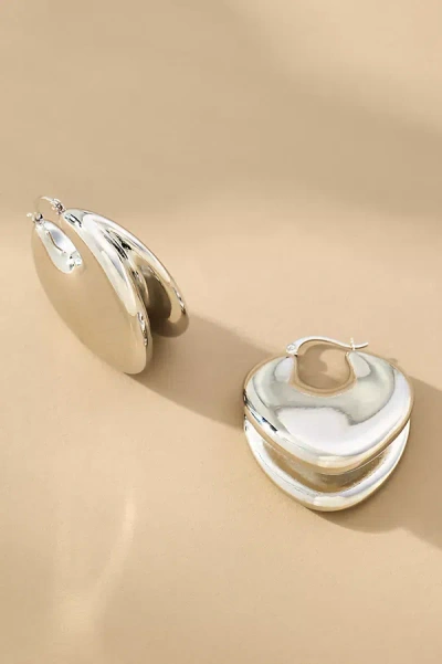 By Anthropologie Mod Clacker Huggie Earrings In Silver