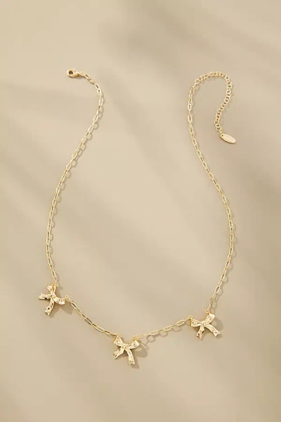 By Anthropologie Multi Bow Necklace In Gold