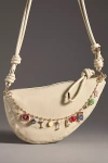 By Anthropologie Party Bag Charm In Gold