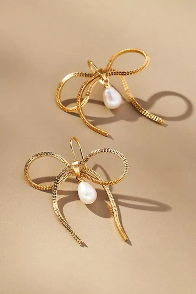 By Anthropologie Pearl Bow Earrings In Gold