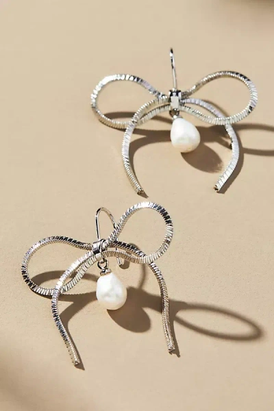 By Anthropologie Pearl Bow Earrings In Silver