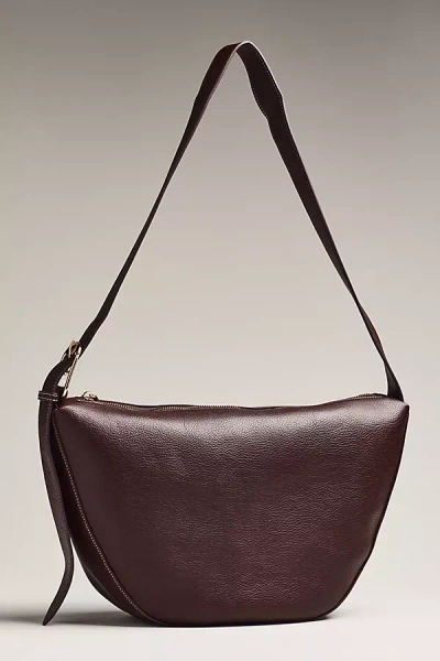 By Anthropologie Polished Pebble Sling Bag In Brown