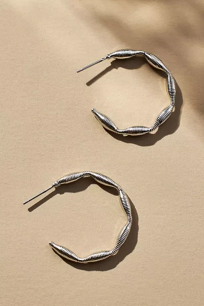 By Anthropologie Ribbed Bean Hoop Earrings In Metallic