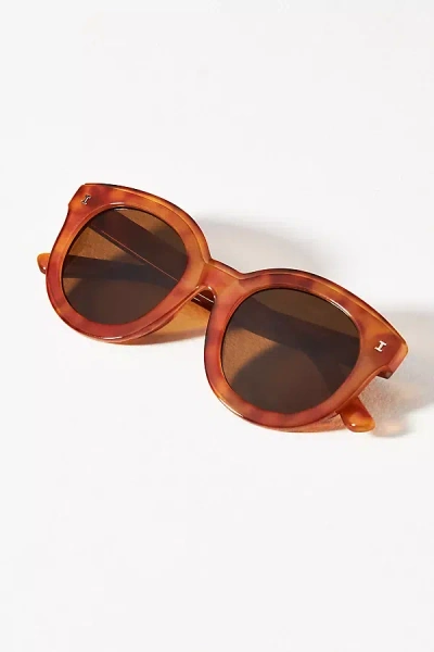 By Anthropologie Round Chunky Tortoise Sunglasses In Red