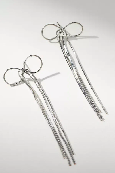 By Anthropologie Slinky Bow Drop Earrings In Metallic