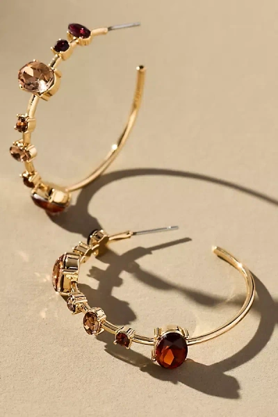 By Anthropologie Spaced Crystal Hoop Earrings In Brown