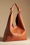 By Anthropologie The Love Knot Slouchy Bag In Beige