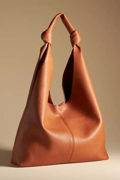 By Anthropologie The Love Knot Slouchy Bag In Beige