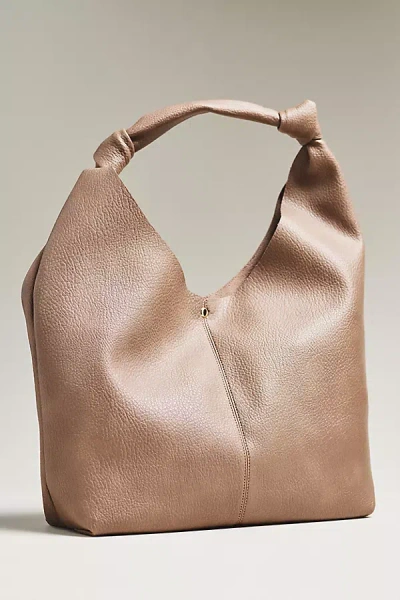 By Anthropologie The Love Knot Slouchy Bag In Brown