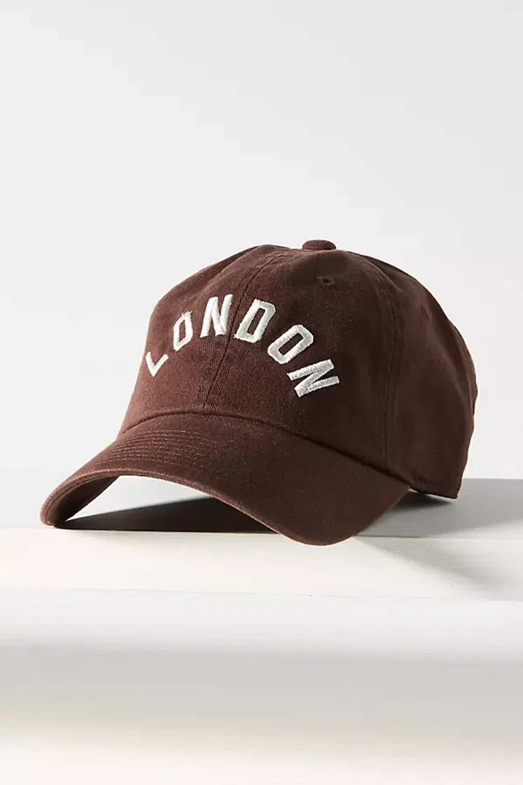 By Anthropologie The Wanderlust London Baseball Cap In Brown  display picture 1