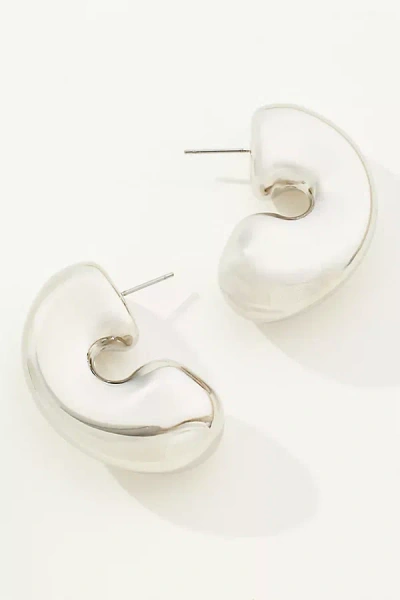 By Anthropologie Thick C-shape Hoop Earrings In Metallic