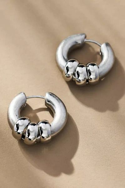 By Anthropologie Thick Charmed Huggie Hoop Earrings In Silver