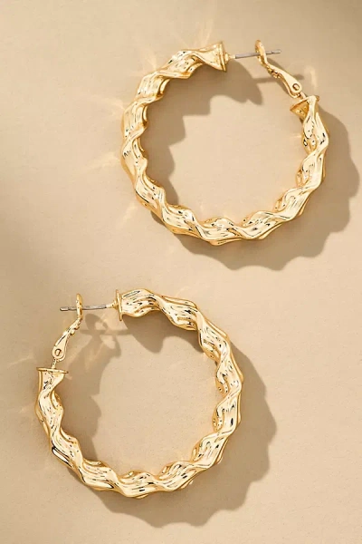 By Anthropologie Twisted Molten Hoop Earrings