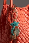 By Anthropologie Under The Sea Beaded Bag Charms In Orange