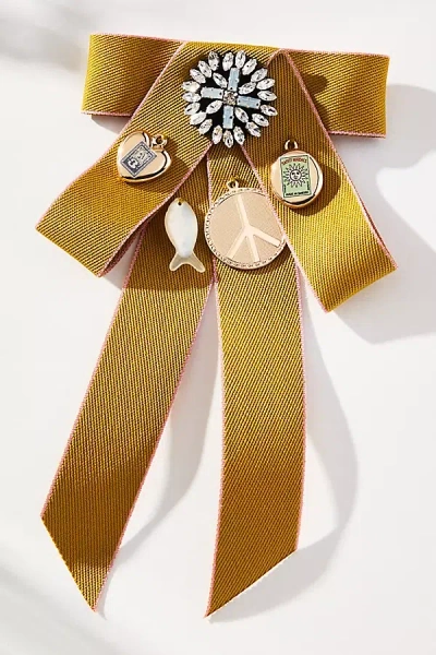 By Anthropologie Varsity Bow Brooch In Gold