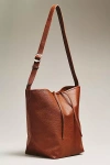 By Anthropologie Vegan Leather Buckle-strap Bucket Bag In Brown