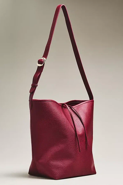 By Anthropologie Vegan Leather Buckle-strap Bucket Bag In Red