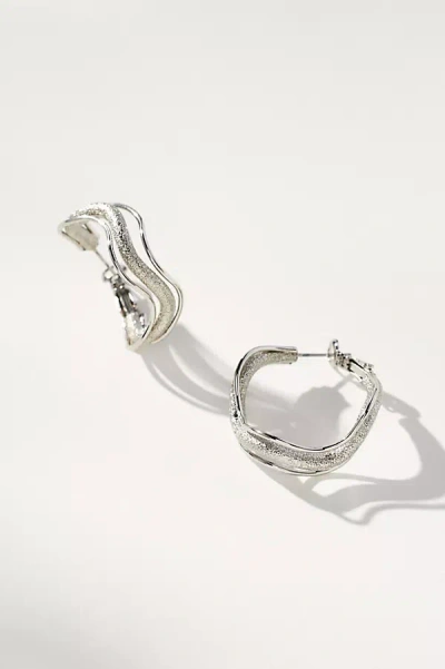 By Anthropologie Wavy Hoop Earrings In Silver