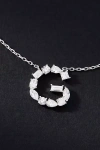 By Anthropologie White Gold Diamond Monogram Necklace In Multicolor