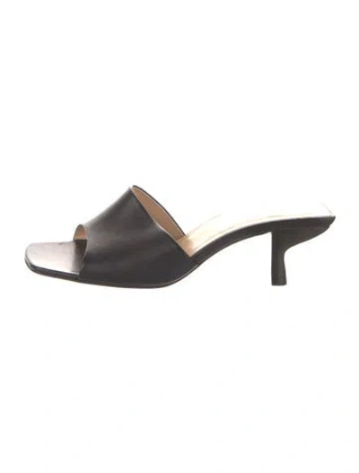 Pre-owned By Far Leather Slides In Black