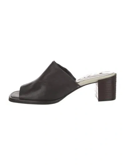 Pre-owned By Far Leather Slides In Black