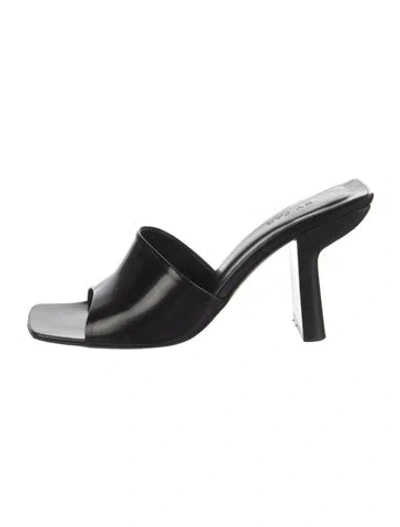 Pre-owned By Far Leather Slides In Black