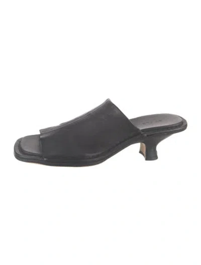 Pre-owned By Far Leather Slides In Black
