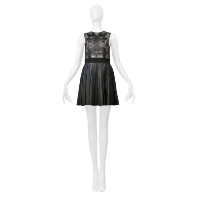 Pre-owned Byblos Black Mini Dress With Sheer Top & Pleated Leather Skirt