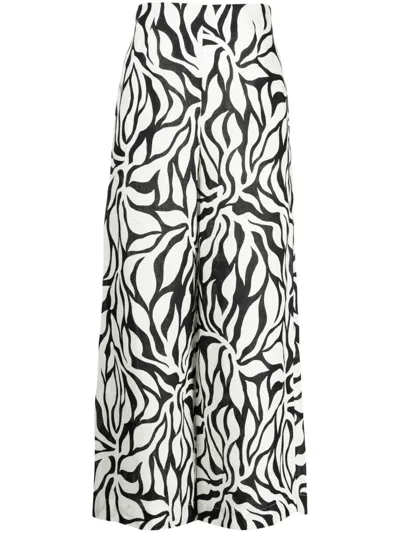 Cala De La Cruz Botanical-print Palazzo Pants In Neutrals