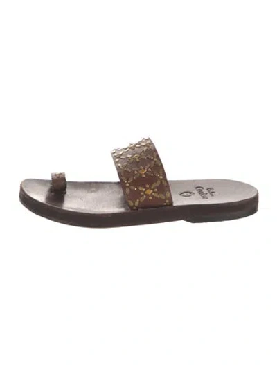 Pre-owned Calleen Cordero Leather Graphic Print Slides In Brown/gold/metallic