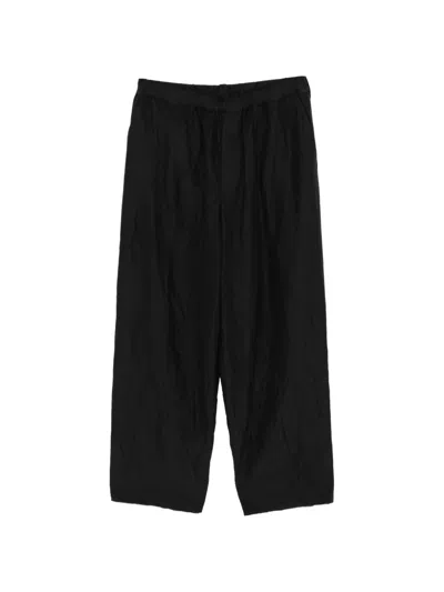 Calmlence Crinkled Wide-leg Trousers In Black