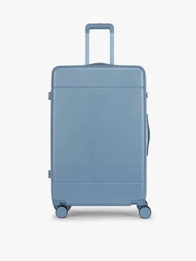 Calpak Hue Large Luggage In Blue