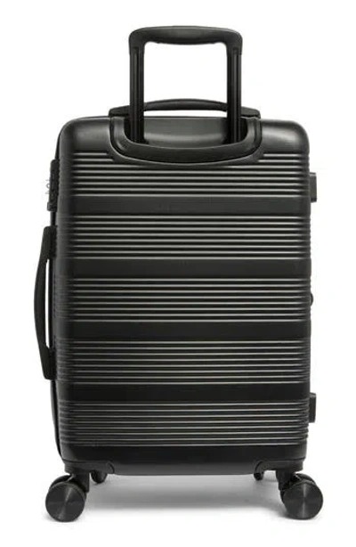 Calpak Indio Collection 20" Carry-on Spinner In Black