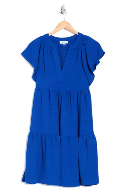 Calvin Klein Aerowash Split Neck Tiered Dress In Blue