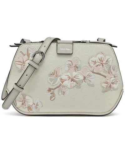 Calvin Klein Audrey Floral Logo Emboss Crossbody In Cream,pink