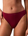 Calvin Klein Bonded Flex Mid Rise Thong In Red