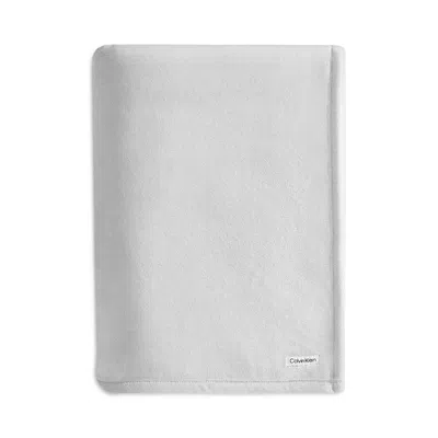CALVIN KLEIN CORE PLUSH SOLID BED BLANKET, KING