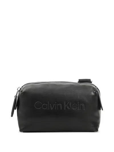 Calvin Klein Embossed-logo Crossbody Bag In Black