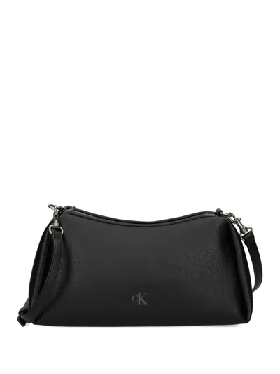 Calvin Klein Embossed Logo Crossbody Bag In Black
