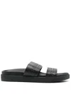 Calvin Klein Embossed-logo Leather Slides In Black